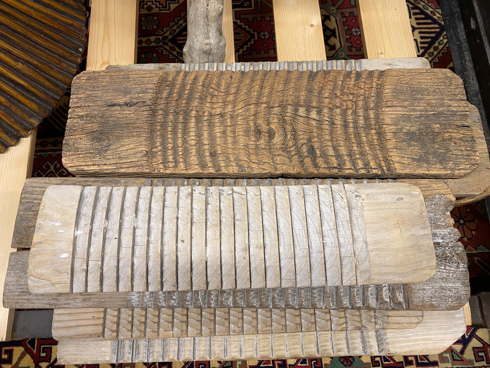 Eight Provincial wooden washboards, breadboard and a stool